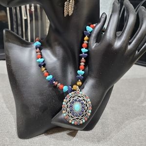 Sterling silver twenty inch necklace with turquoise stones